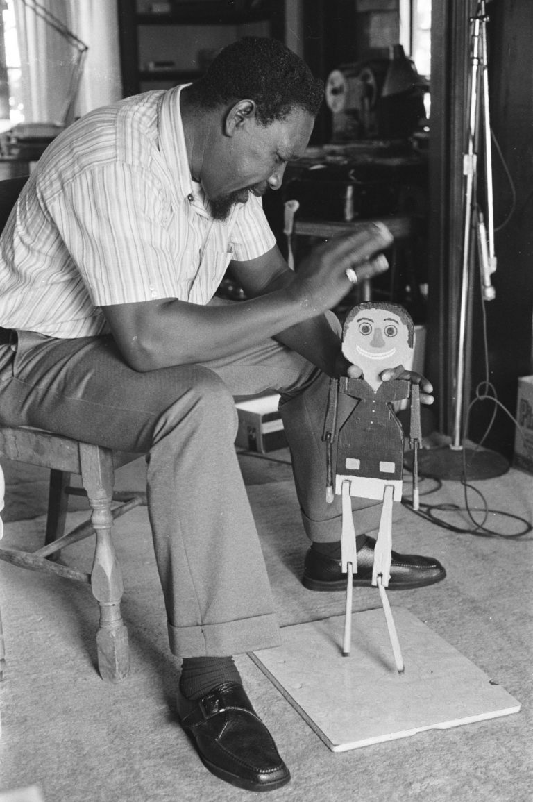 J.C. Burris pictured with his dancing doll, Mr. Jack.
